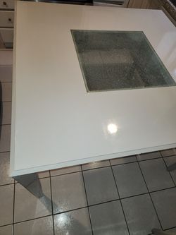 Dinning table with center glass.