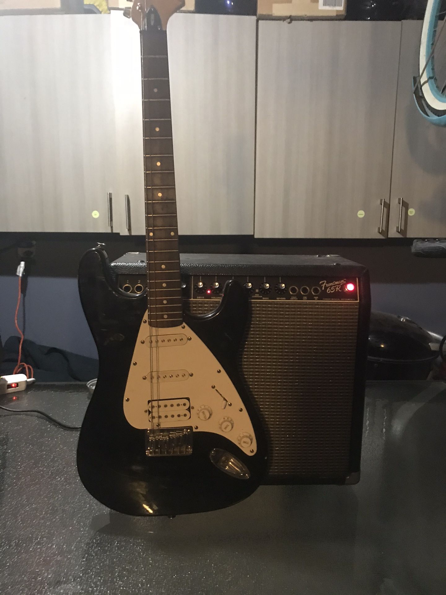 Electric guitar and speaker