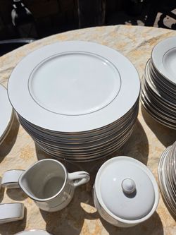 White Porcelain Dinnerware Set with Gold Trim