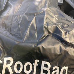 ROOF TRAVEL  BAG  35”width 39” long  10” height on the front 16” height on the rear. Look like was used once .  straps. And anti slip mat included Bol