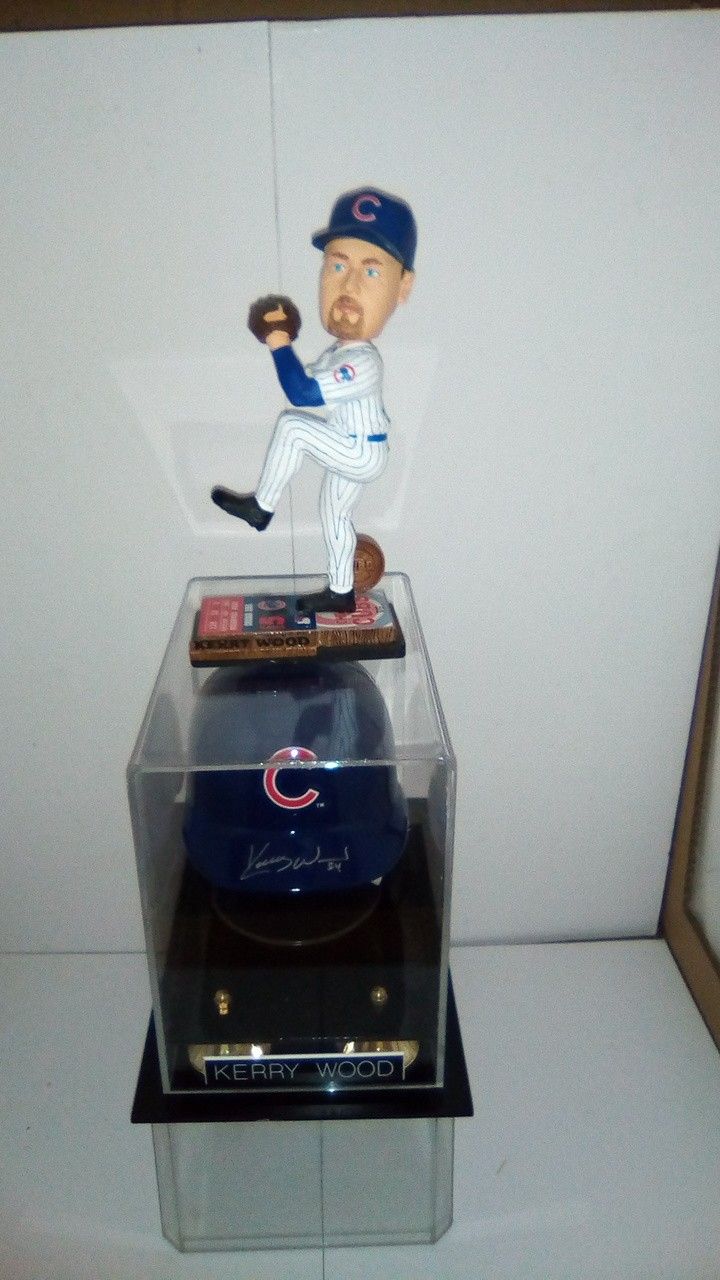Kerry Wood autographed mini helmet with display and bobblehead