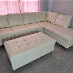 I'm selling a sectional with an ottoman. Ask for the price. 