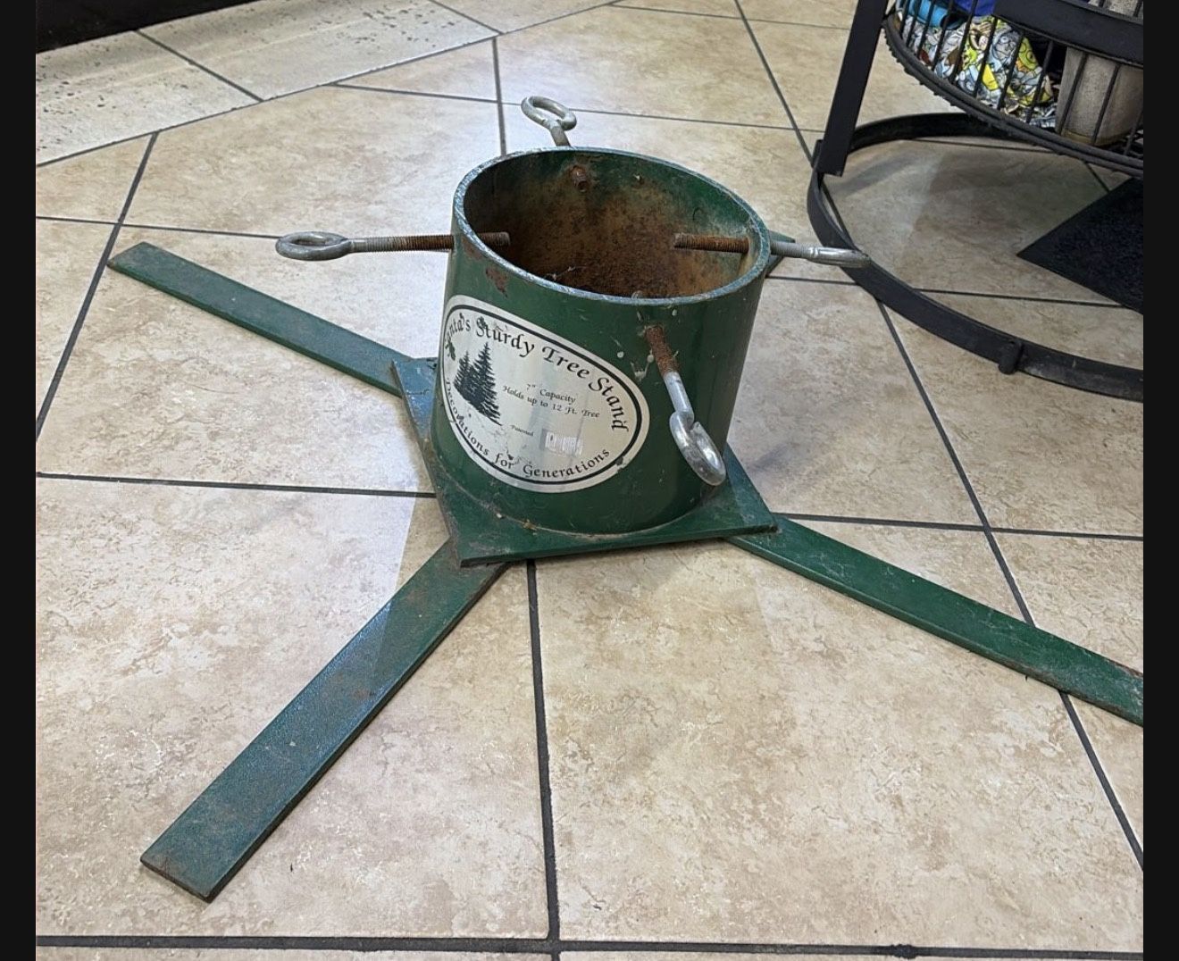 Santa’s Sturdy Tree Stand Holds Up To A 12 Foot Tree