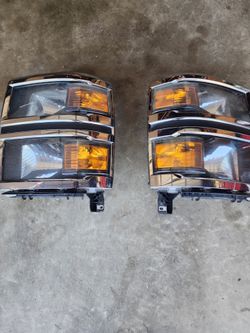 2014 2015 Chevy Silverado 1500 headlight, assembly, right and left $150.