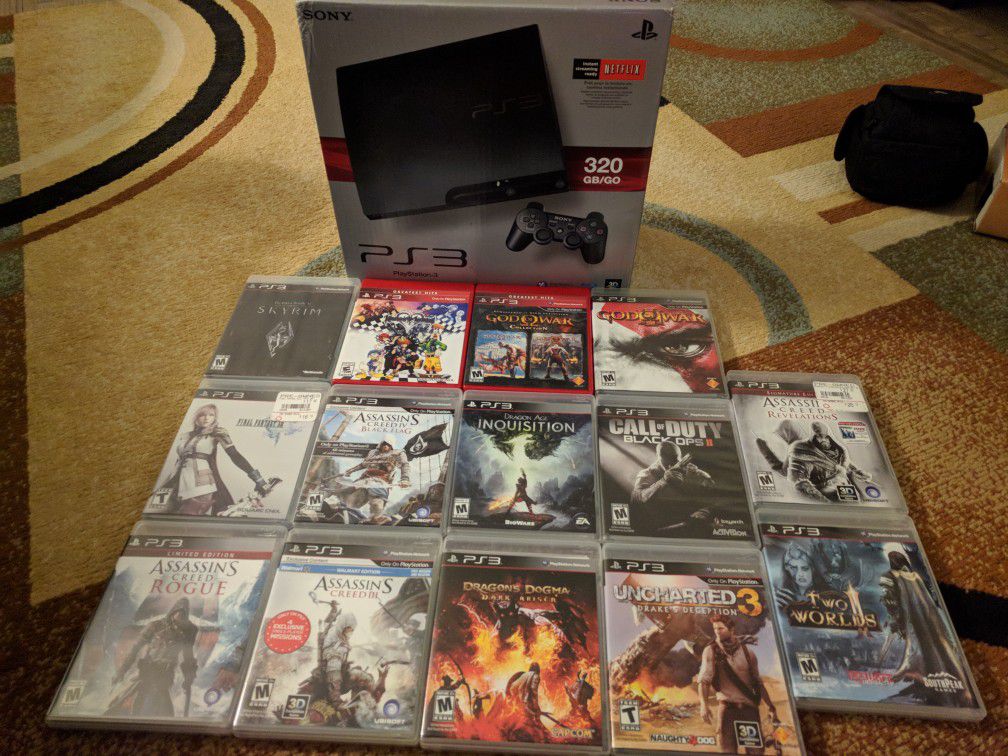 PlayStation 3 console with 15 games(original box and cables)