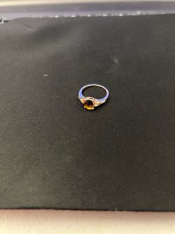 Ring Dark Reddish Brown Gemstone With Accent Stones