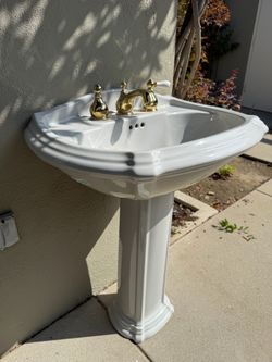 Light Grey Porcelain Pedestal Sink with Gold Faucet