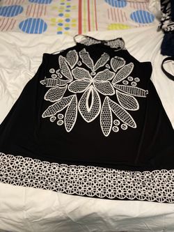 Black Sleeveless Top with White Floral Print