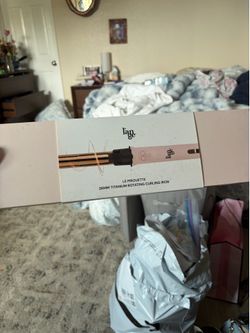 Rotating curling iron