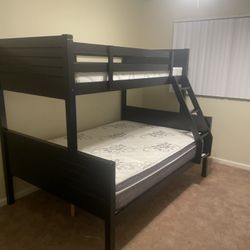 Free delivery. Twin/full $350 for bunk bed only. $550 with mattresses. Available in espresso and white  Assembly required. Assembly not included. Cash