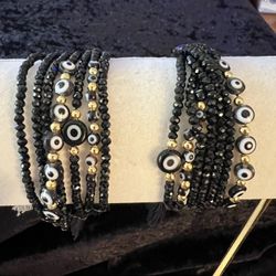 Pulceras Negras Y Plateadas Con Ojo Turco . 