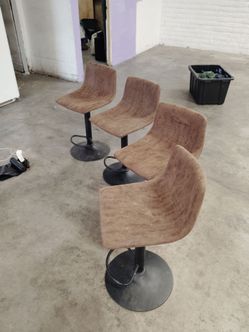Four bar stools awesome for out side , they adjust sizes