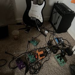 Electric Guitar With Pedals And Amp