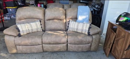 Beige power reclining sofa with 2 separate power reclining love seats