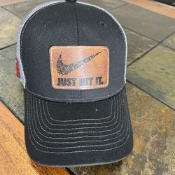 Black Nike Cap With “just Hit It “ Slogan 