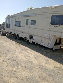 5th wheel needs TLC some roof work bike and go cart don't run sold as is