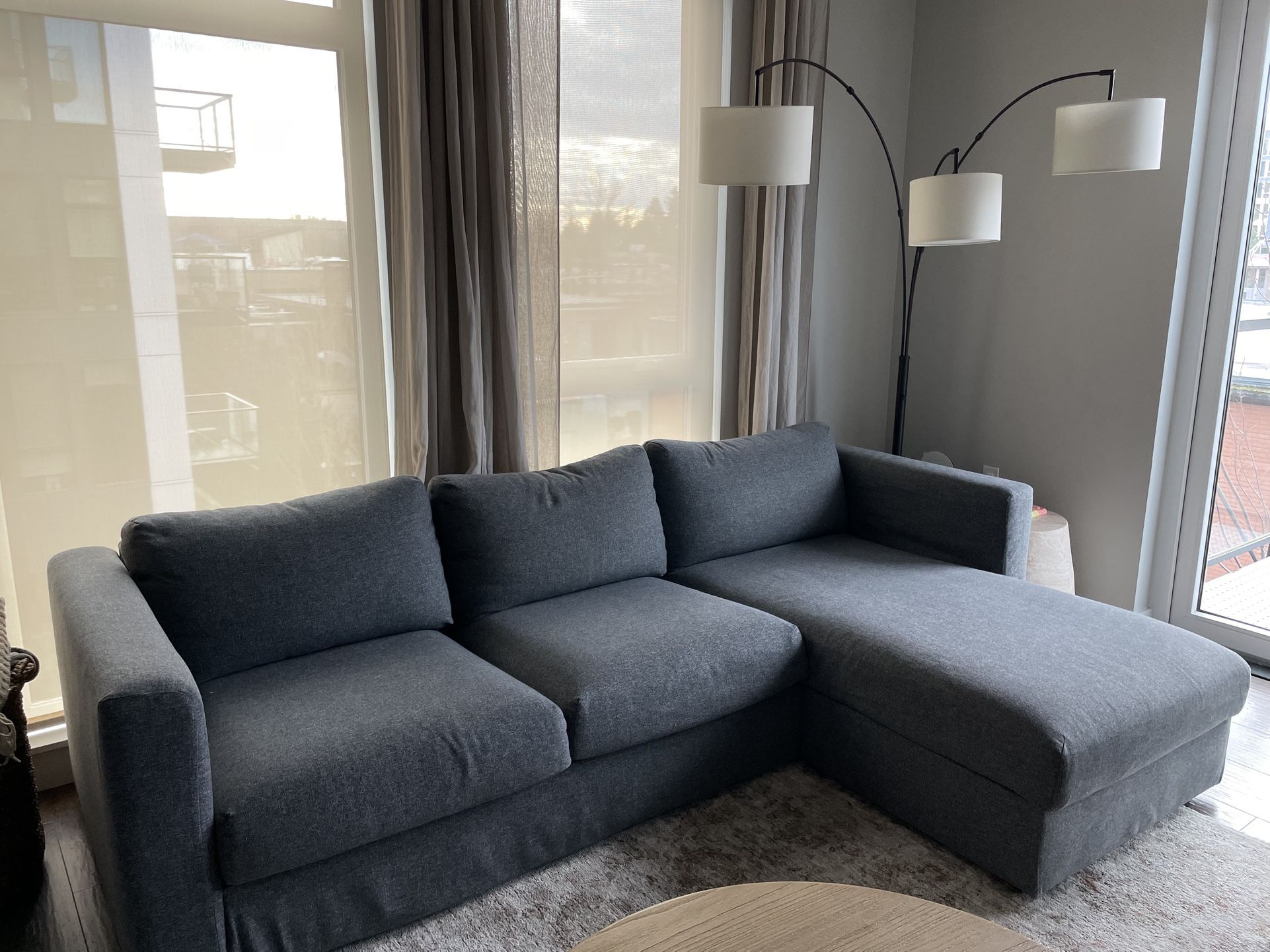 Grey L-Shape sofa couch with storage chaise