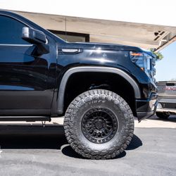 KMC IMS All Black 17” 6x5.5 W/ 37” Toyo Rt Trail Wheel Package 