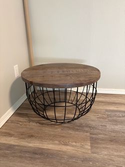 Rustic wood and iron round coffee table/ottoman