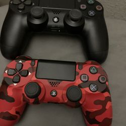 Two Ps4 Controllers One Red Camo &one Black 