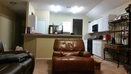 Chocolate Leather couch and a peanut butter one seater