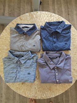 Travis Mathew Polos 