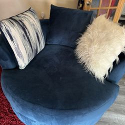 Blue Swivel Chair With Pillows 
