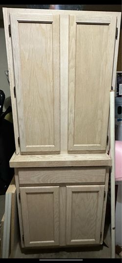 2 cabinets for office, laundry, garage.