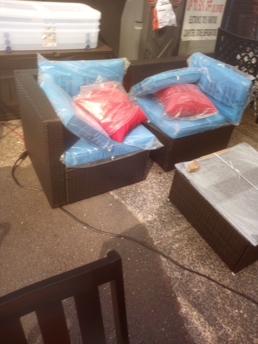 New RATTAN OUT DOOR SET. 3 PIECES PATIO SET WITH A SMALL TABLE