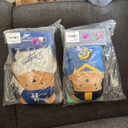 Two Nfl Commemorative plushies One For A Dodgers Fan And One For Rams Fan