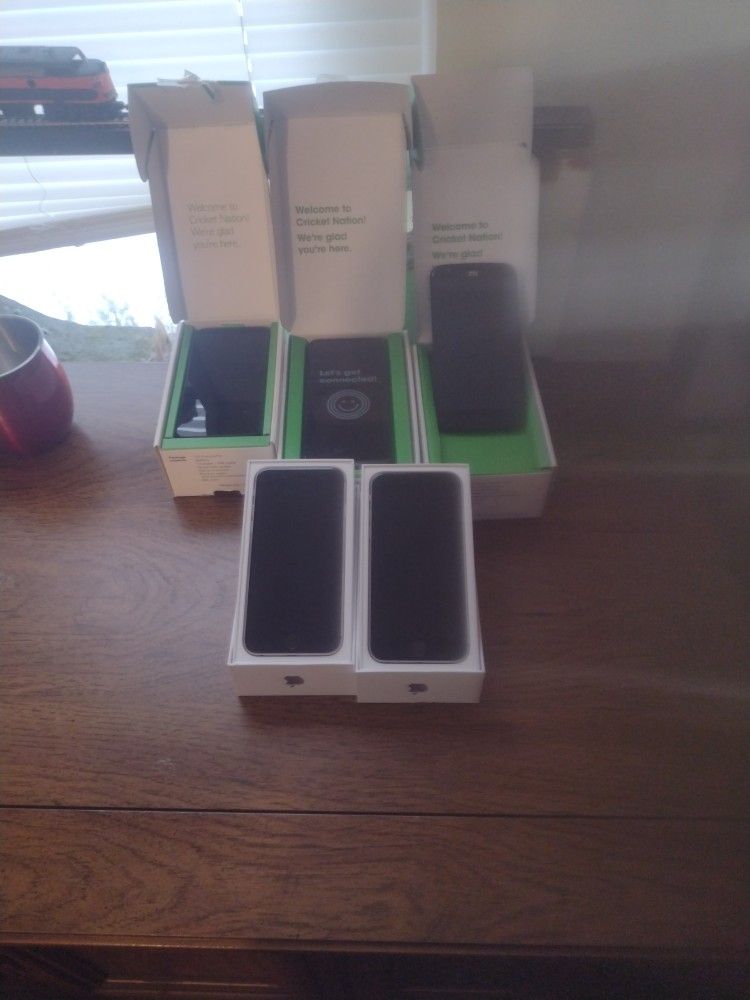 I Got Five Phones For Sale With The Boxes Three Androids And Two iPhone 6s 64 Gig
