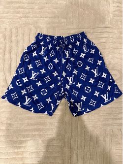 Lv shorts size medium blue with pattern
