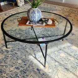New SAFAVIEH Couture Collection Black Metal/Tempered Glass Top Round Coffee Table.