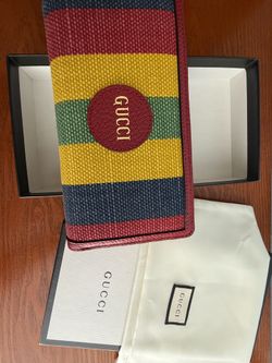 Selling this multicolor canvas baiadera zip around gucci wallet