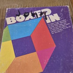 Two vintage Games Boxed In and It's Not Easy