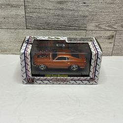 M2 Machines Ground Pounders Orange ‘1969 Ford Mustang • Die Cast Metal • Made in China Scale 1:64