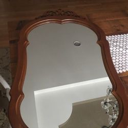 Beautiful wooden Lexington dress up etched mirror.