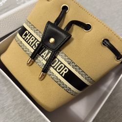 Christian dior Beige canvas bucket bag with pearl charm - Gift with purchase from the store (GWP)