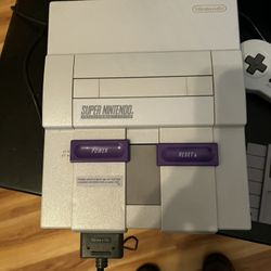 Super Nintendo Includes 4 Games