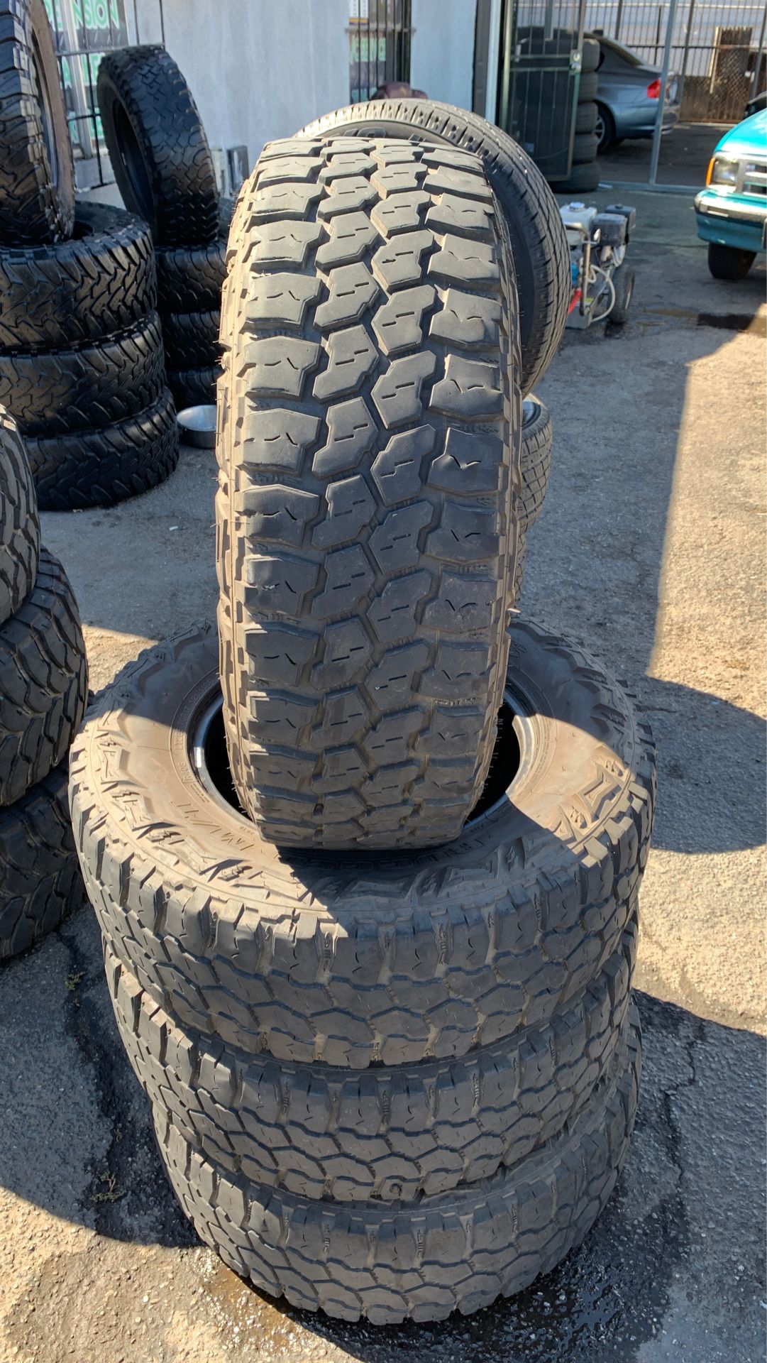 (4) 265/70/17 AMERICUS RUGGED M/T TIRES (GOOD CONDITION for Sale in