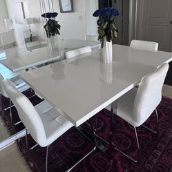 Modern chrome metal dining table (chairs sold separately)