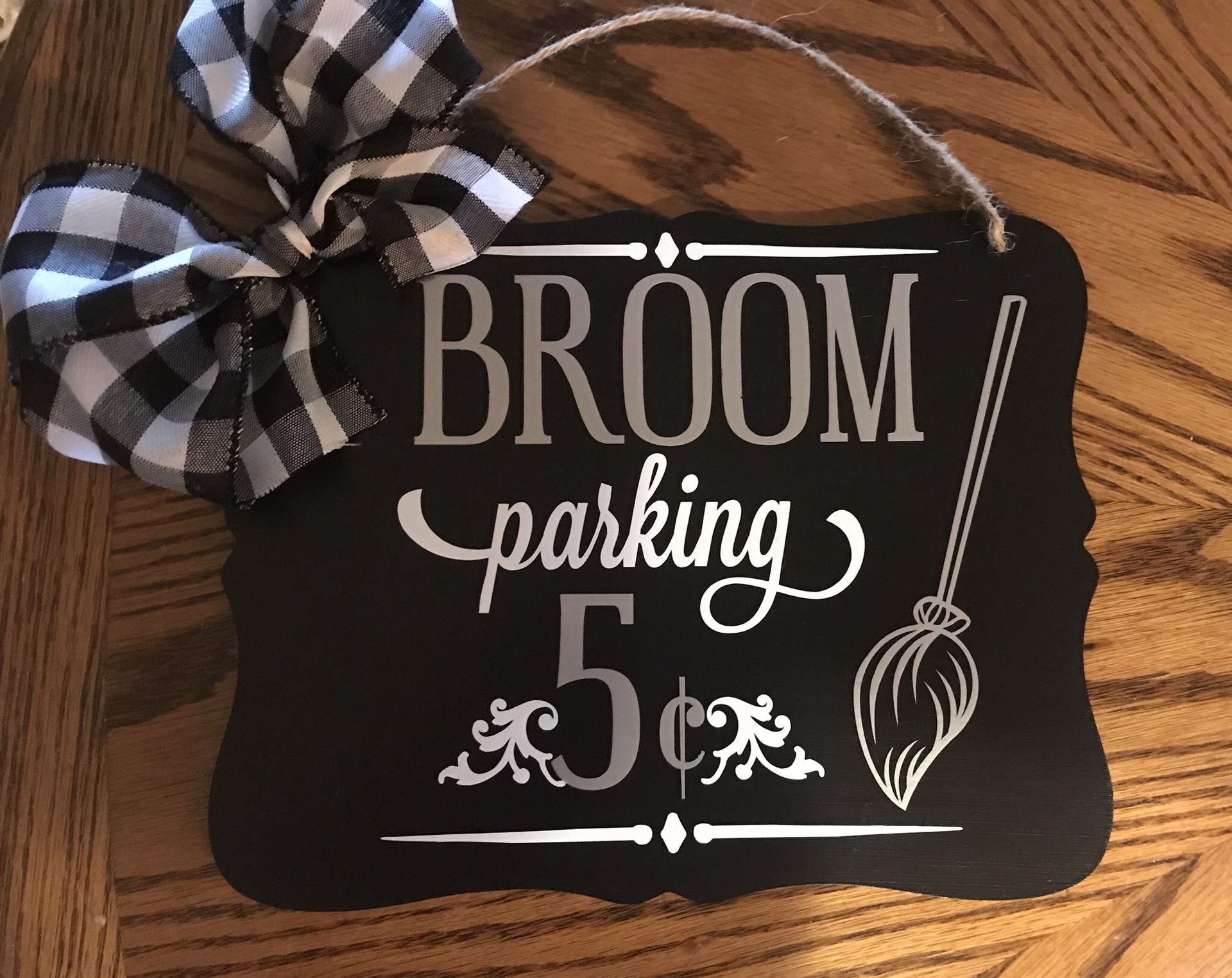 Broom parking sign