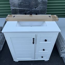 Bathroom vanity w/ sink, faucet + backsplash