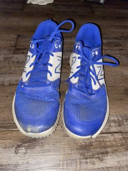 New balance blue and white turf baseball cleats