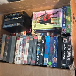 VHS Tapes And Old Gaming Consoles 
