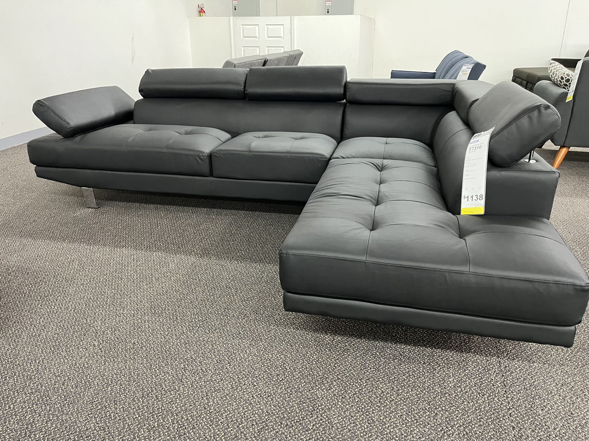 New Sectional W Adjustable Headrests . Black Leather . 106” X 77”. Free Delivery !