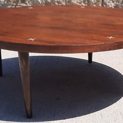 beautiful walnut 1957 round COCKTAIL COFFEE TABLE with STAR  inlays and long legs And many More 