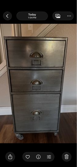 Metal filing cabinet with casters- $30