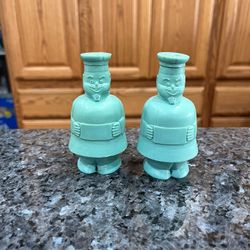 Vintage plastic  Pair of Salt and Pepper Shakers.  Size approximately 4 inches tall.  Preowned.  