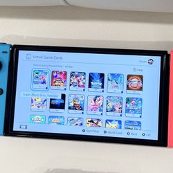 Nintendo Switch OLED Model Including 17 Games and Official Nintendo Accessories